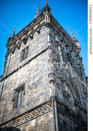 Ornate historic church facade against blue sky Ornate historic church facade against blue sky 140409951