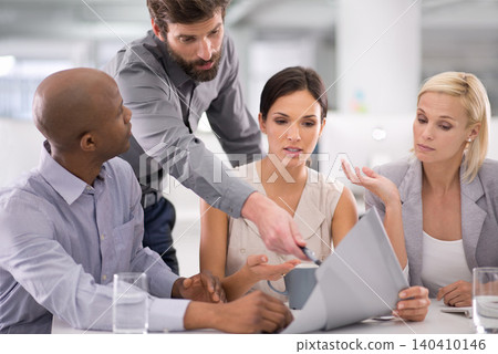 Business people, documents and pointing in team discussion, meeting or collaboration at office. Young group of employees or colleagues brainstorming, reading schedule or planning project at workplace Business people, documents and pointing in team discussion, meeting or collaboration at office. Young group of employees or colleagues brainstorming, reading schedule or planning project at workplace 140410146