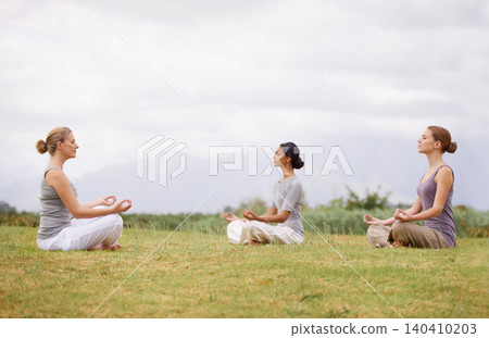 Lotus, group and meditation in nature for yoga, healthy body and mindfulness exercise to relax. Peace, instructor and calm women in padmasana outdoor on mockup, spirituality and breathing together Lotus, group and meditation in nature for yoga, healthy body and mindfulness exercise to relax. Peace, instructor and calm women in padmasana outdoor on mockup, spirituality and breathing together 140410203