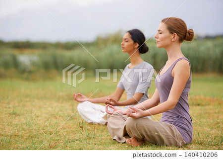 Lotus, friends and meditation outdoor for yoga, healthy body and mindfulness exercise for fitness. Peace, zen and calm women in padmasana in nature for balance, spirituality and practice for wellness Lotus, friends and meditation outdoor for yoga, healthy body and mindfulness exercise for fitness. Peace, zen and calm women in padmasana in nature for balance, spirituality and practice for wellness 140410206