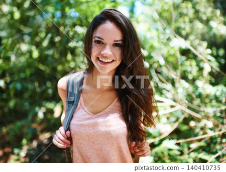 Nature, hiking and portrait of woman with backpack for outdoor adventure trail on vacation. Smile, travel and female person with bag for trekking in forest, field or woods on holiday or weekend trip. Nature, hiking and portrait of woman with backpack for outdoor adventure trail on vacation. Smile, travel and female person with bag for trekking in forest, field or woods on holiday or weekend trip. 140410735