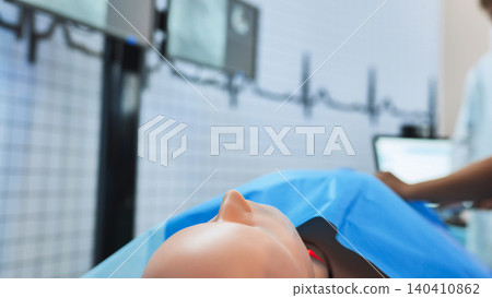 Medical simulation mannequin laying on bed for healthcare training in hospital Medical simulation mannequin laying on bed for healthcare training in hospital 140410862