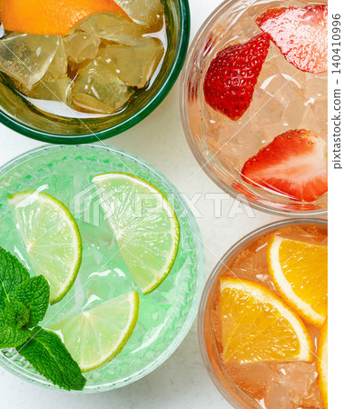 Colorful fruit drinks ice summer background Colorful fruit drinks ice summer background 140410996