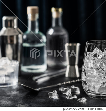 Ice filled glass for cocktail preparation Ice filled glass for cocktail preparation 140411002