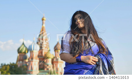 Indian woman traveling to Moscow posing by Saint Basil's Cathedral 140411013