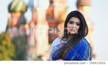 Bangladeshi woman posing in front of Saint Basil's Cathedral in Moscow, Russia Bangladeshi woman posing in front of Saint Basil's Cathedral in Moscow, Russia 140411020