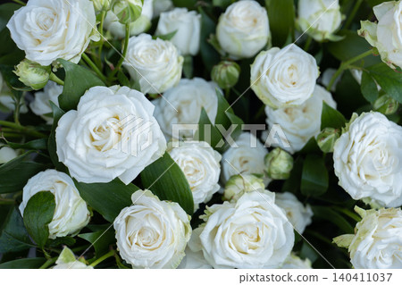 White rose bouquet symbolizing wedding, purity, romance, and elegance 140411037