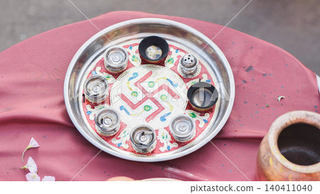 Ganesha Chaturthi puja thali with swastika symbol for Hindu ritual ceremony 140411040