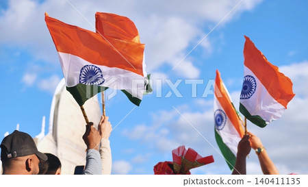Indian flags waving during India Day celebration in Moscow Indian flags waving during India Day celebration in Moscow 140411135