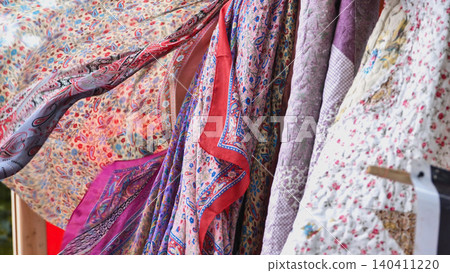 Indian fabrics and textiles with paisley patterns blowing at Moscow cultural festival Indian fabrics and textiles with paisley patterns blowing at Moscow cultural festival 140411220