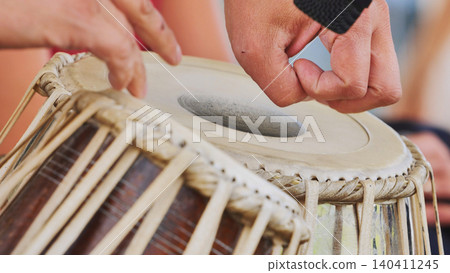 Hands performing on tabla drums during India Day cultural festival in Moscow Hands performing on tabla drums during India Day cultural festival in Moscow 140411245