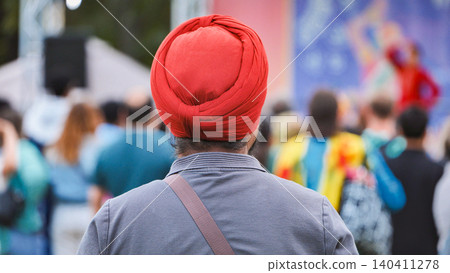 Sikh man observing India Day festival with crowd in Moscow Sikh man observing India Day festival with crowd in Moscow 140411278