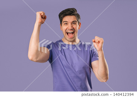 Handsome Surprised Man With Triumph Yes Victory Gesture. Jackpot, Win, Success. Handsome Surprised Man With Triumph Yes Victory Gesture. Jackpot, Win, Success. 140412394