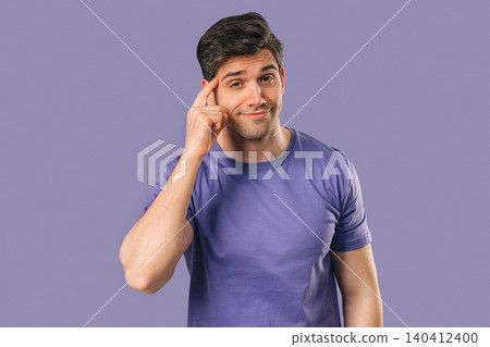 Mature Handsome Clever Man With Gesture - You, Think About It. Tapping Temple 140412400