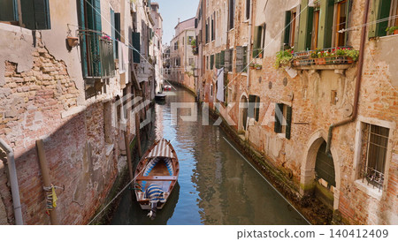 Narrow Venetian Canal in Daylight, Italy Travel Destination, vacation Narrow Venetian Canal in Daylight, Italy Travel Destination, vacation 140412409