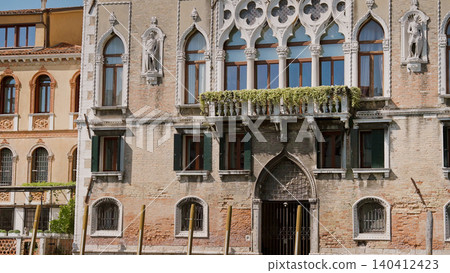 Classic Venice Grand canal houses viewed from vaporetto boat - waterbus. Italy Classic Venice Grand canal houses viewed from vaporetto boat - waterbus. Italy 140412423