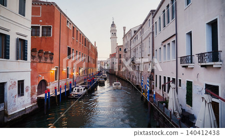 Venice canal view with leaning bell tower at peaceful evening. San Giorgio dei Greci church Venice canal view with leaning bell tower at peaceful evening. San Giorgio dei Greci church 140412438