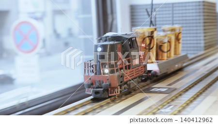 Model train delivering multiple beers on miniature railway Model train delivering multiple beers on miniature railway 140412962