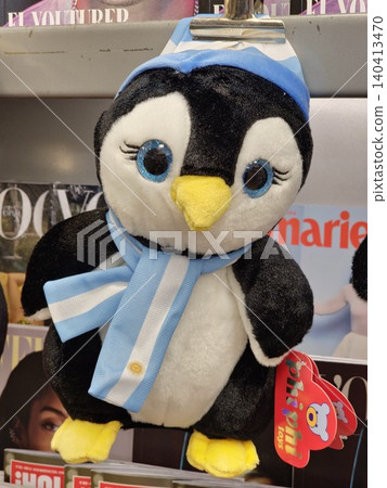 Buenos Aires, Argentina - March 29, 2026: Front view of an Argentine penguin souvenir at Aeroparque Jorge Newbery airport. Buenos Aires, Argentina - March 29, 2026: Front view of an Argentine penguin souvenir at Aeroparque Jorge Newbery airport. 140413470