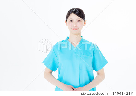 Female nurse wearing scrubs Female nurse wearing scrubs 140414217