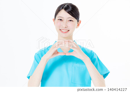 Female nurse wearing scrubs 140414227