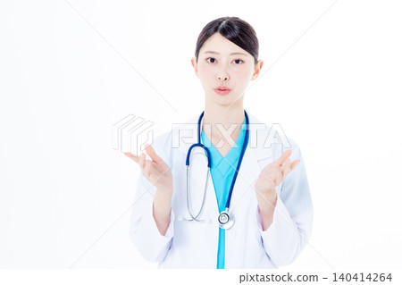 Female doctor speaking from the camera Female doctor speaking from the camera 140414264