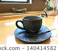 Enjoying a modern Japanese-style coffee at a cafe counter (A scene with coffee) 140414582