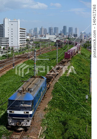 EF210-310 container freight train running on the Northern Freight Line EF210-310 container freight train running on the Northern Freight Line 140417268