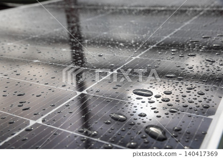 Photovoltaic panel after rain in cloudy day. Photovoltaic panel after rain in cloudy day. 140417369