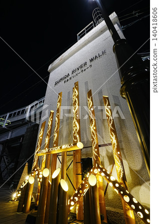 A lit-up bamboo lantern at the entrance to Sumida River Walk in Tokyo, Japan at night. 140418606