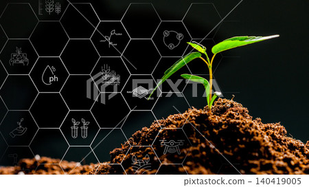 Smart farming technology shown with a plant growing in soil and digital elements around it Smart farming technology shown with a plant growing in soil and digital elements around it 140419005