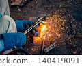 Cutting steel with gas, gas welding and oxy-fuel cutting are processes that use fuel gases and oxygen to weld and cut metals, respectively. industrial worker cutting thick steel in workshop. 140419091