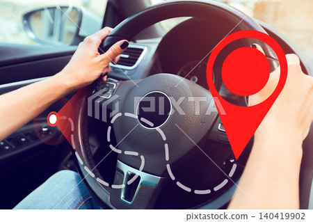 Map showing taxi route while someone drives a vehicle through a city at daytime Map showing taxi route while someone drives a vehicle through a city at daytime 140419902