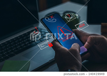 Scam call sms message received on smartphone during work hours in a home office setting Scam call sms message received on smartphone during work hours in a home office setting 140419949