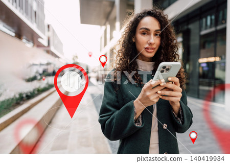 Woman using smartphone to find taxi route in urban area during daytime Woman using smartphone to find taxi route in urban area during daytime 140419984