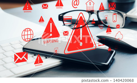 Scam call text message warning on smartphone screen with computer and glasses nearby Scam call text message warning on smartphone screen with computer and glasses nearby 140420068