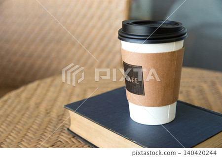 The leisure of a cup of coffee at a cafe The leisure of a cup of coffee at a cafe 140420244