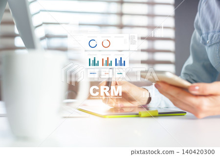 CRM software usage for customer management in a modern office on a workday CRM software usage for customer management in a modern office on a workday 140420300