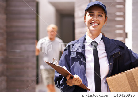 Delivery woman, box and clipboard in portrait at house for customer with smile for shipping in neighborhood. Girl, courier and employee in supply chain, logistics and checklist for cardboard package Delivery woman, box and clipboard in portrait at house for customer with smile for shipping in neighborhood. Girl, courier and employee in supply chain, logistics and checklist for cardboard package 140420989