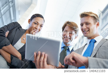 Business people, tablet and consulting for project in office, collaboration and unity for proposal. Staff, workplace and teamwork for reading a report, support and online for review and networking 140421103
