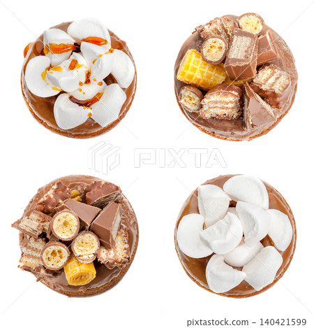 Different types of desserts on a white background with various toppings and chocolates 140421599
