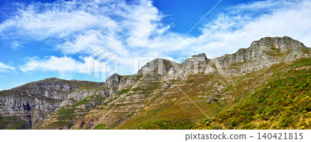 Mountains, sunshine and blue sky with nature, clouds and stone with landscape and weekend break. Empty, rock and grass with flowers and countryside with summer and travel with vacation or environment Mountains, sunshine and blue sky with nature, clouds and stone with landscape and weekend break. Empty, rock and grass with flowers and countryside with summer and travel with vacation or environment 140421815