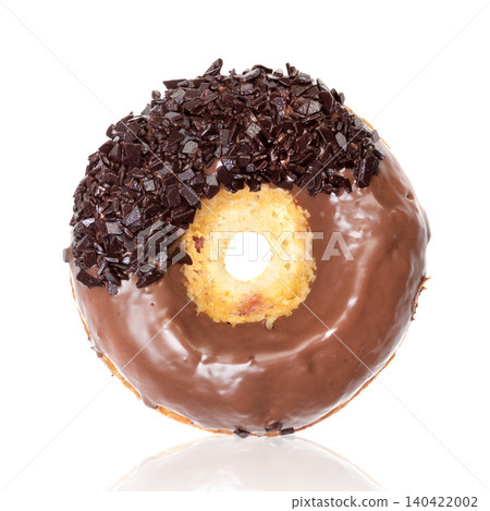 Delicious donut with chocolate icing and topping served on a white background Delicious donut with chocolate icing and topping served on a white background 140422002