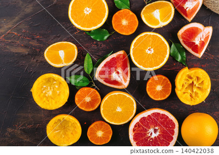 Sliced citrus fuits juicy on table close up 140422038