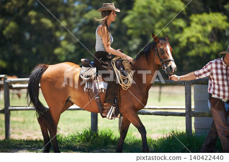 Female woman, horse and farm with cowboy, stable and ranch in Texas for pony riding. Stallion, mare and animal paddock for equestrian learning, countryside and lessons for sports for beginner rider 140422440