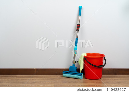 Cleaning tools for house cleaning on wooden floor Cleaning tools for house cleaning on wooden floor 140422627