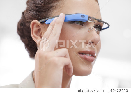 Augmented reality, vision and woman with smart glasses, internet connection and business in office. Future technology, workplace and consultant girl with designer VR eyewear, focus and electronics. Augmented reality, vision and woman with smart glasses, internet connection and business in office. Future technology, workplace and consultant girl with designer VR eyewear, focus and electronics. 140422930