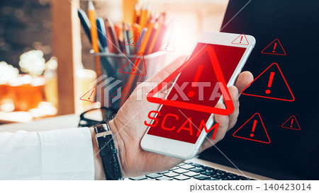 Warning about scam call sms messages on a smartphone in an office setting Warning about scam call sms messages on a smartphone in an office setting 140423014