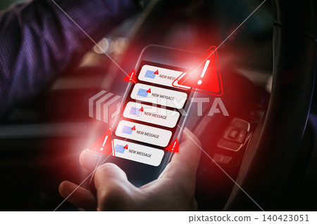 Scam message notification appears on a smartphone while driving Scam message notification appears on a smartphone while driving 140423051