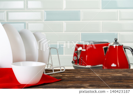 Various kitchen ware on a kitchen counter 140423187